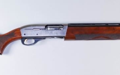 A Semi Automatic 12 Bore Shotgun, by Remington, Model...