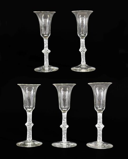 A Set of Five Wine Glasses, circa 1750, the bell...