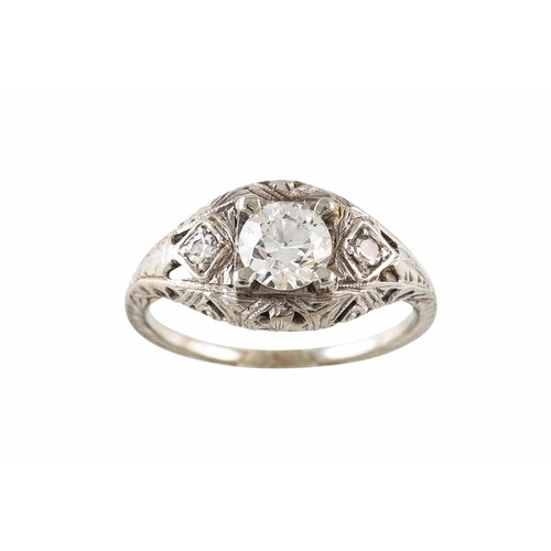 A VINTAGE DIAMOND SOLITAIRE RING, the old cut diamond to dia...