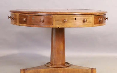 A Victorian mahogany drum table, third quarter 19th century, the circular top...