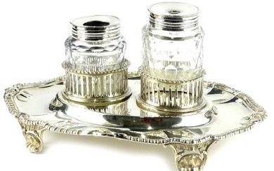 A Victorian silver inkstand, of oval form with gadrooned...