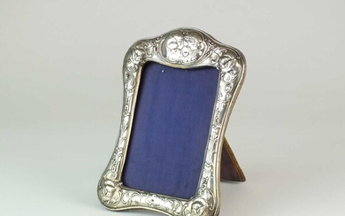 A Victorian silver mounted photograph frame