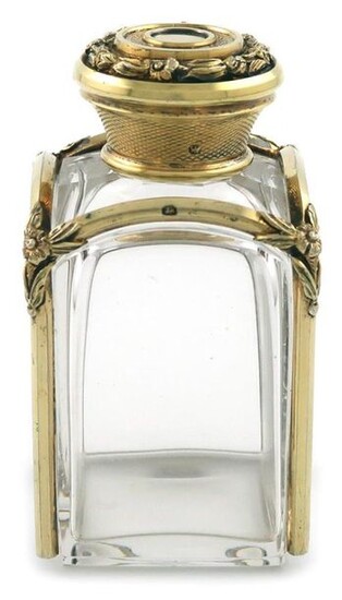 A William IV silver-gilt mounted scent bottle, by Rawlings and Summers, London 1835, upright rectangular form, plain glass body, silver-gilt ribs with foliate corners, screw-off cover with engine-turned and foliate decoration, height 8.4cm.
