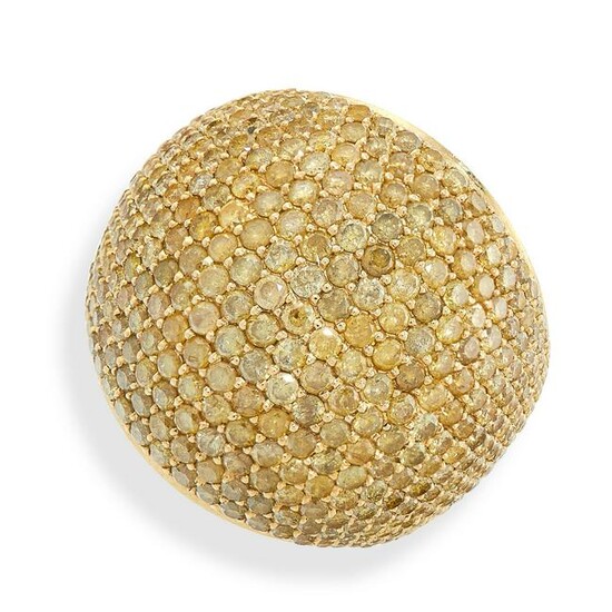 A YELLOW DIAMOND COCKTAIL RING of bombe design, pave