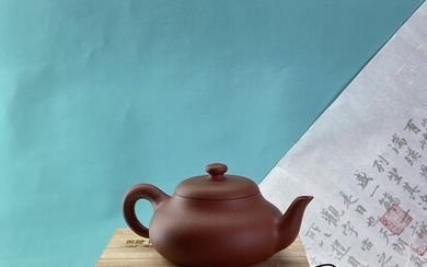 A Yixing zhuni 宜兴朱泥 “RongTian” 容天 teapot by “Chaozhou”...