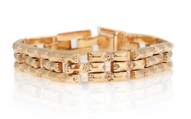 A bracelet of 18k gold. Weight app. 21 g. W. 10 mm....