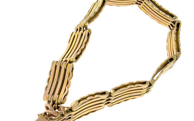 A bracelet, with heart-shape padlock clasp.