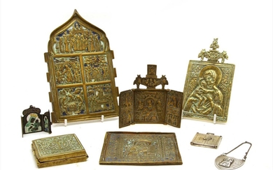 A collection of Russian silver and bronze icons