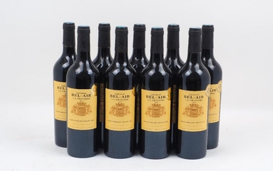 A collection of nine bottles of Chateau Bel-Air La Graviere,...