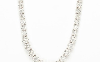 A diamond and eighteen karat gold revière necklace