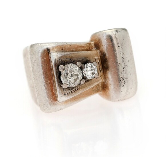 NOT SOLD. A diamond ring set with two old-cut diamonds, mounted in silver. Size app....