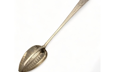 A fine George III Irish silver divided straining spoon, Jame...