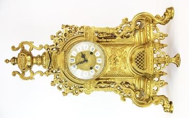 A large gilt brass mantle clock, H. 59cm.