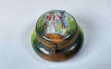 A late 19th century Continental porcelain patch box with transfer...