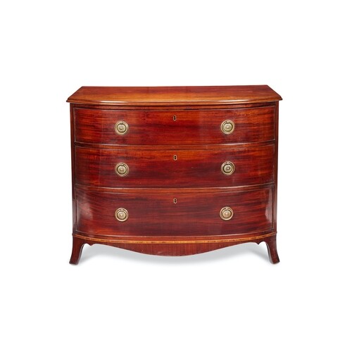 A late George III mahogany bowfront chest / commode The rect...