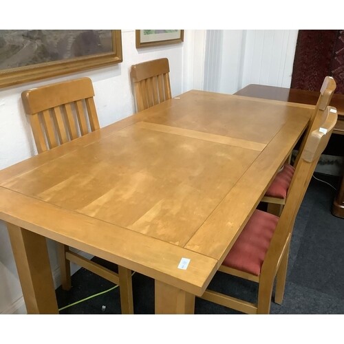 A light oak style modern dining table 6ft long x 3ft wide an...