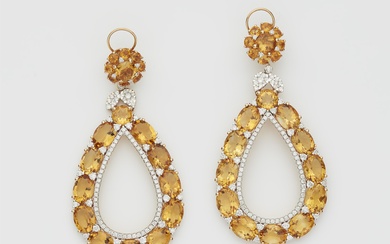 A pair of 18k gold citrine and diamond pendant earrings.