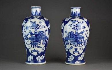 A pair of Chinese blue and white baluster vases, Kangxi marks but later
