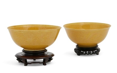 A pair of Chinese yellow glazed porcelain bowls