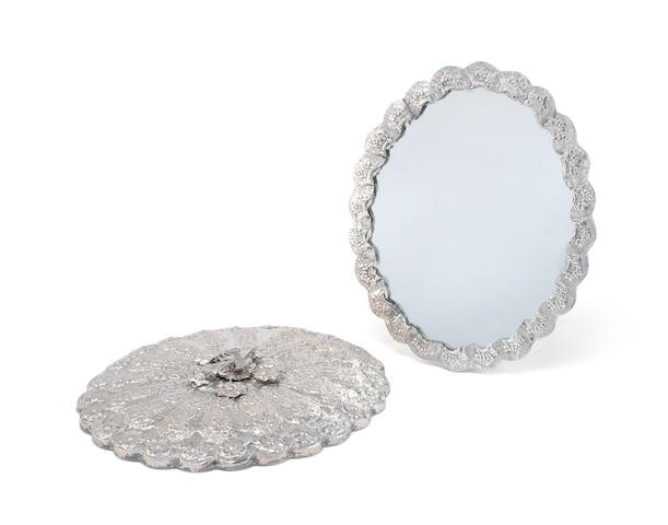 A pair of Egyptian silver mirrors
