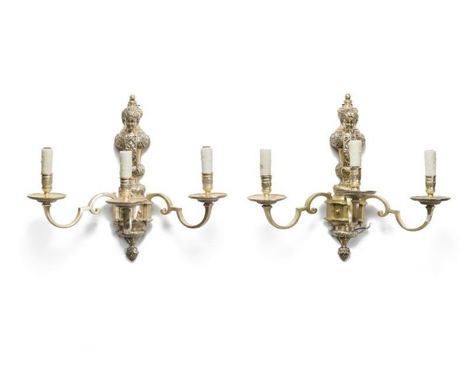 A pair of French silvered-bronze three-light sconces