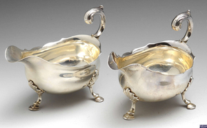 A pair of George II silver sauce boats by David Hennell I.