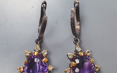 A pair of amethyst and topaz earrings in black rhodium-plated sterling silver with gold plating (2)
