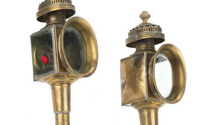 A pair of candle brass carriage lamps