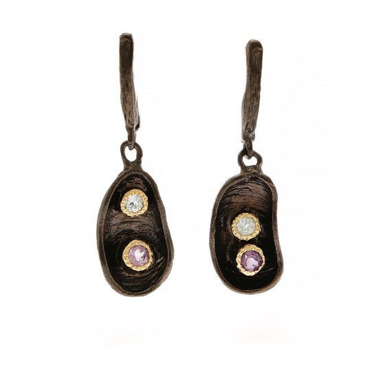A pair of ear pendants each set with a circular-cut amethyst and topaz, mounted in black rhodium plated and partly gilded sterling silver. (2)