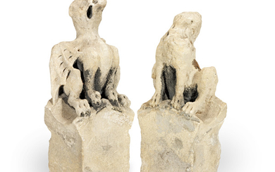 A pair of limestone gargoyles