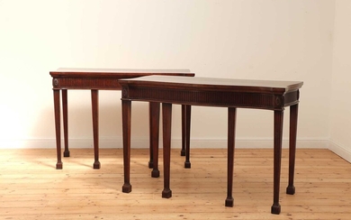 A pair of mahogany console tables