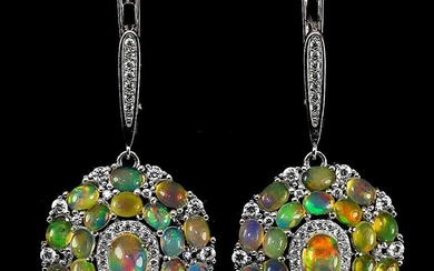 NOT SOLD. A pair of opal and zirconia ear pendants each set with numerous opals and zirconias, mounted in sterling silver. L. app. 4 cm. (2) – Bruun Rasmussen Auctioneers of Fine Art