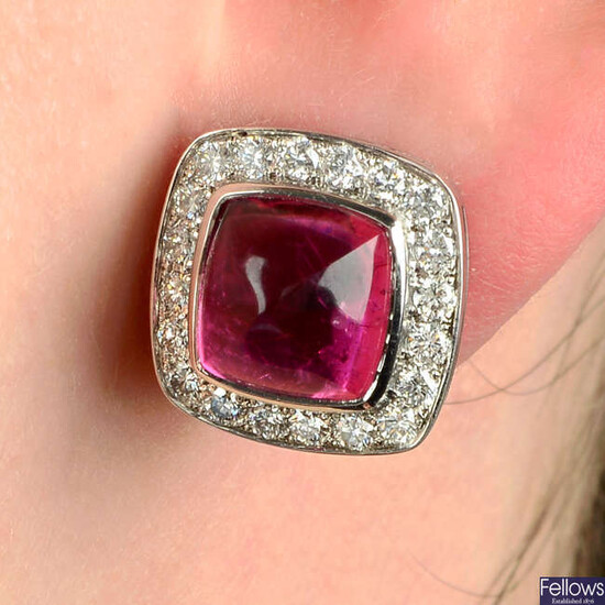 A pair of pink tourmaline cabochon and brilliant-cut diamond earrings.