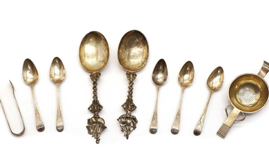 A pair of silver serving spoons