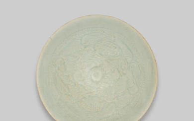 A qingbai carved 'two boys' bowl
