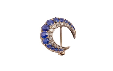 A sapphire and diamond crescent brooch