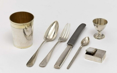 A seven-piece travel cutlery set in a leather case