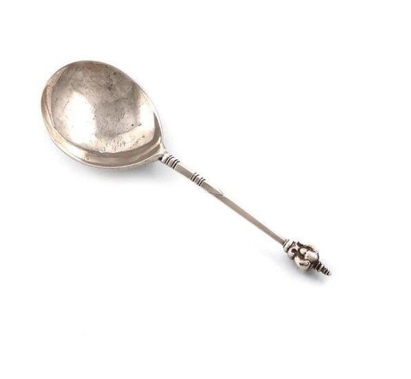 A seventeenth century silver Cherub knop spoon, marks worn, also with a worn cone mark, in the Scandinavian manner, fig-shaped bowl, the reverse inscribed ~K.P.D~ 1664~, tapering stem with a cherub head finial, length 15.3cm, approx. weight 1.2oz.