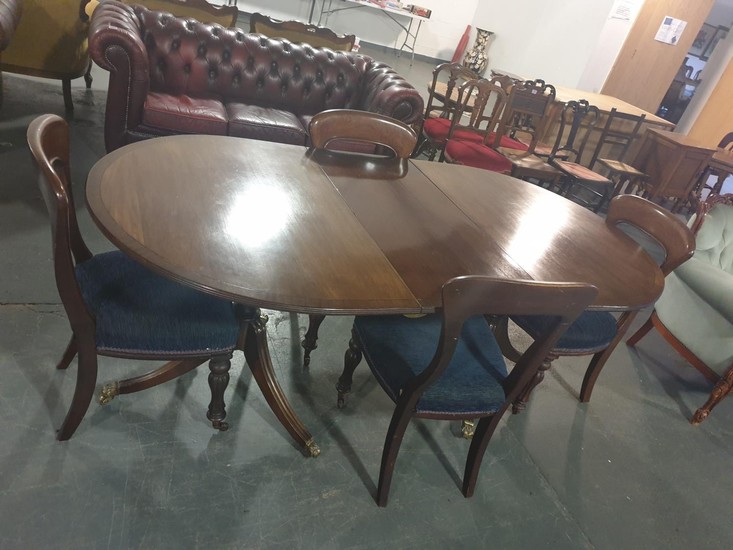 A twin pedestal mahogany Regency style table and four Regenc...