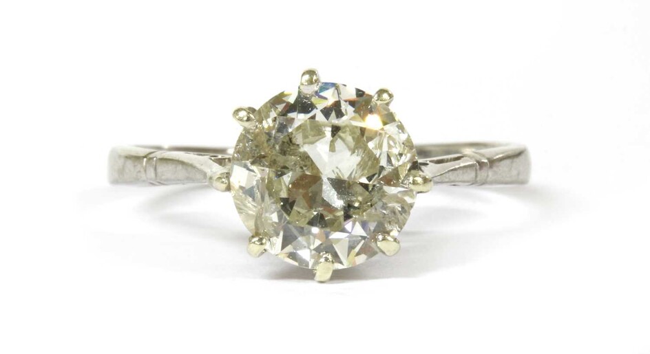 A white gold single stone diamond ring