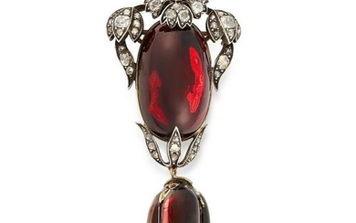 AN ANTIQUE GARNET AND DIAMOND MOURNING PENDANT /