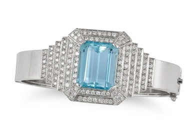 AN AQUAMARINE AND DIAMOND BANGLE the hinged bangle set with an octagonal step cut aquamarine of