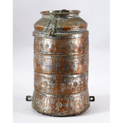AN ISLAMIC TINNED COPPER FOUR TIER STORAGE VESSEL - engraved...