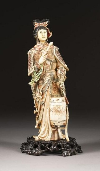 AN IVORY CARVED STATUE OF MULAN