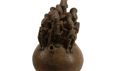 African Pottery Figural Group on Vessel.
