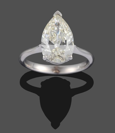 An 18 Carat White Gold Pear Cut Diamond Solitaire Ring, the pear cut diamond in a three claw...