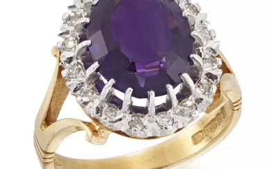 An 18ct gold amethyst and diamond cluster ring, an oval...