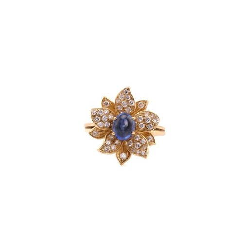 An 18ct gold sapphire and diamond flower ring, comprises an ...