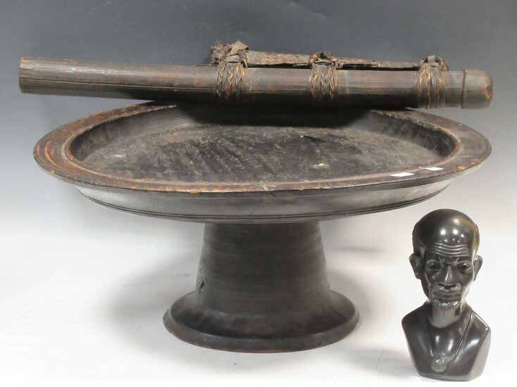 An African treen tazza, together with a quiver of arrows and a carved hardstone bust of a man