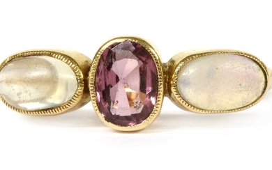 An Edwardian gold garnet, opal and moonstone ring